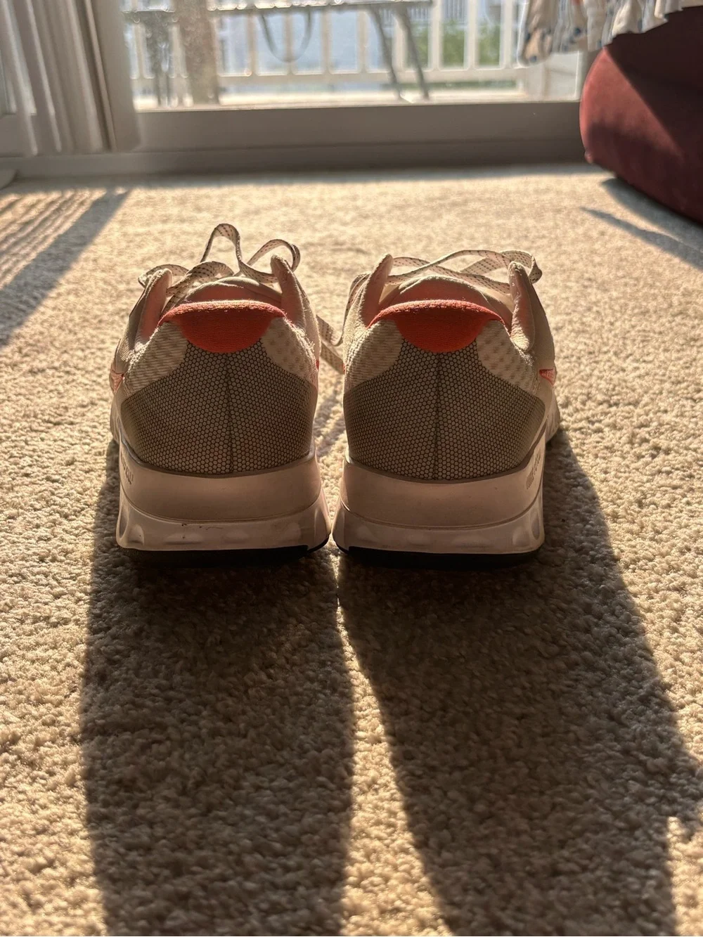 Nike Women's Cream Athletic Sneakers with Coral Accents